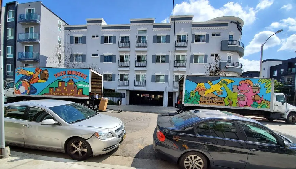 Two trucks at the big size local moving project. Trek Movers